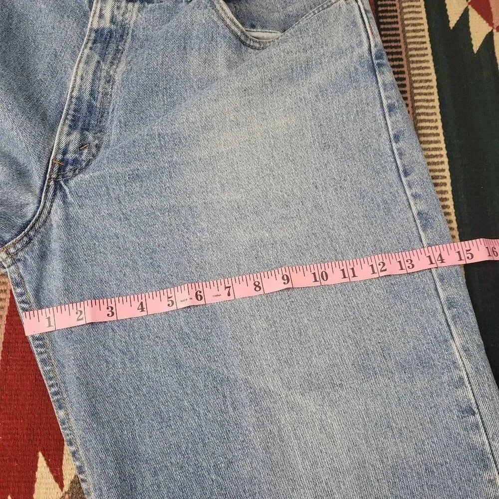 Vintage 90s Levi's 560 Loose Fit Tapered‎ Leg Denim Jeans Sz 38x28.5 Light Wash